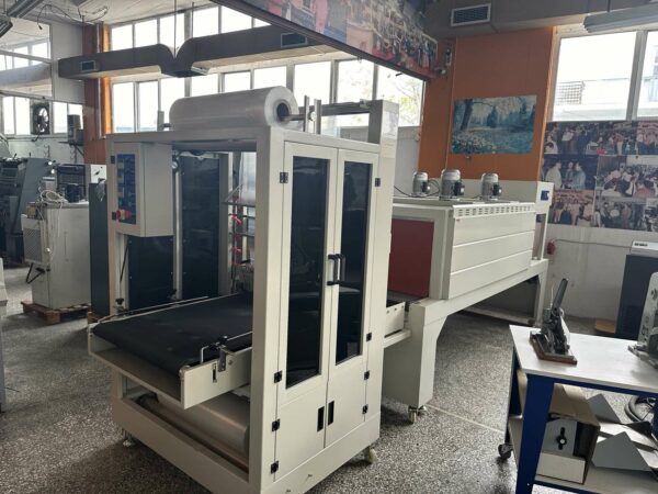 SHRINK WRAPPING MACHINE